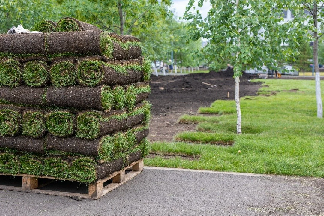 A mound of new sod that is ready to be installed.