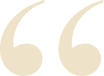 A large, gold-colored quotation mark on a black background.