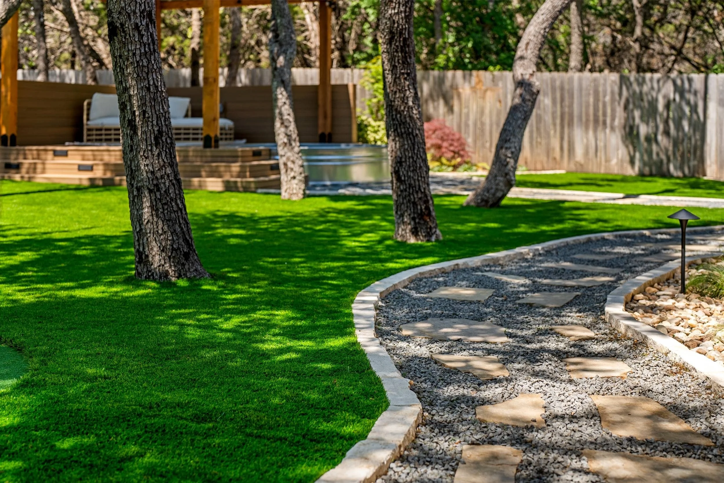 Professional Yard Cleanup Refreshing a Residential Landscape in Leander, TX