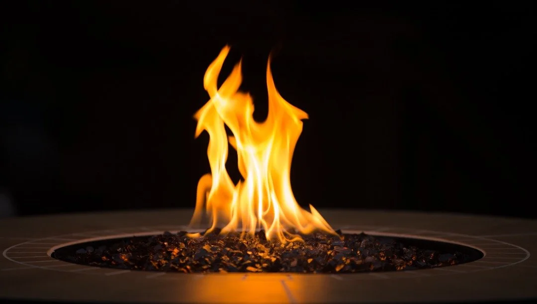A bright flame from a propane fire pit.