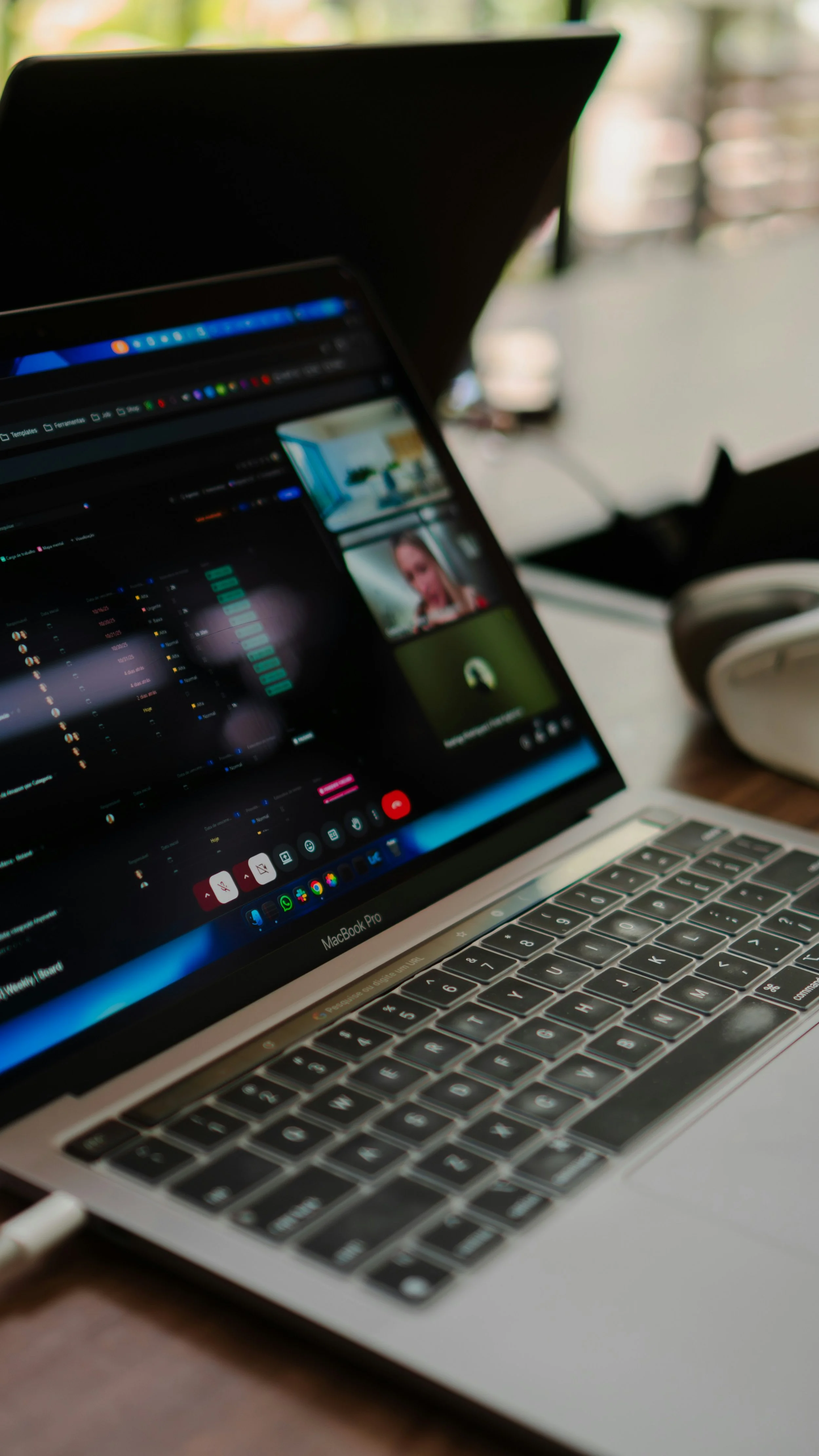 image of a computer while people have a virtual consultation meeting