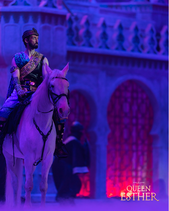 conrad bear riding a white horse