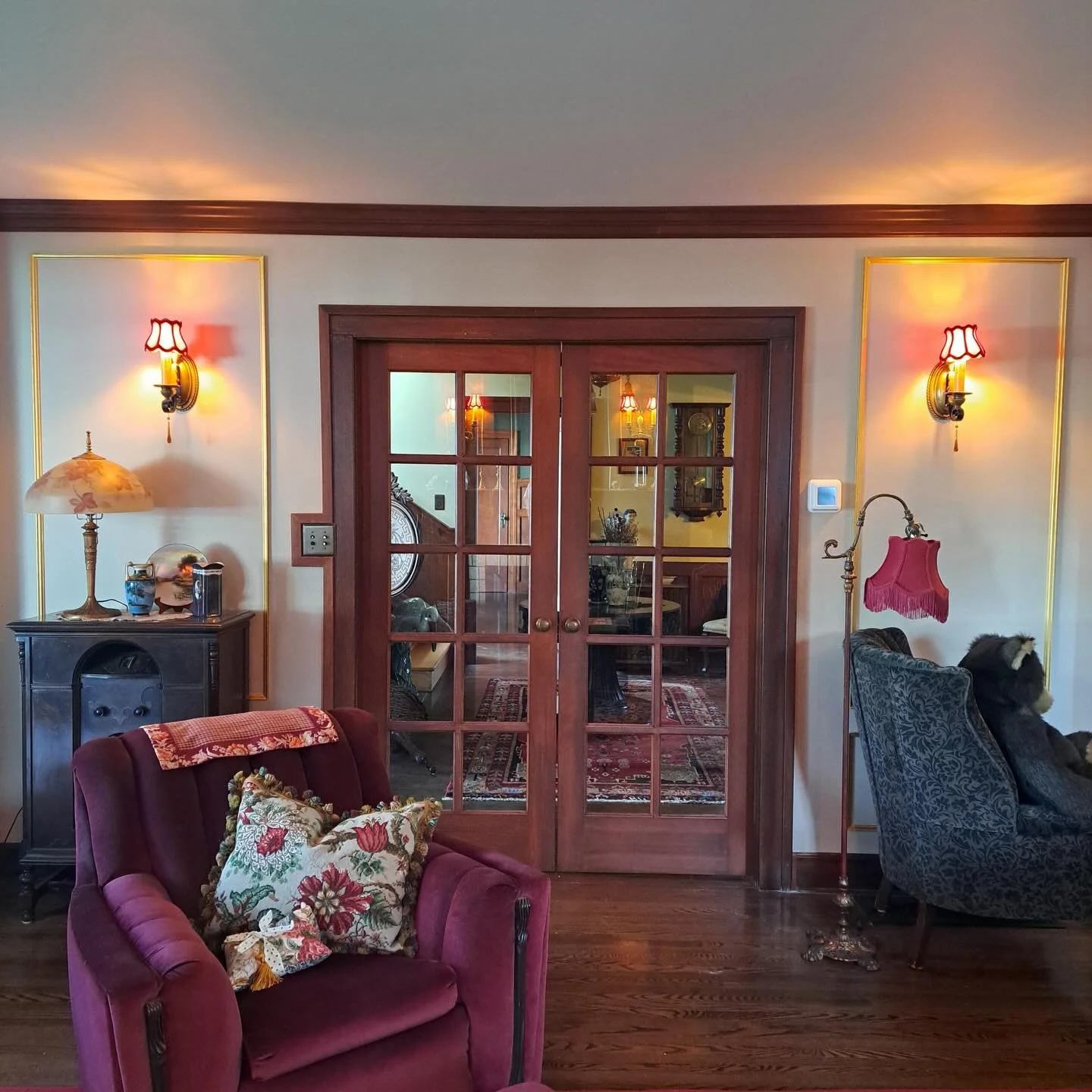 A colourful home with some beautiful stained trim and doors!