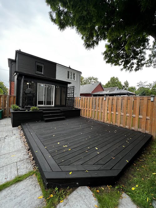 Cedar deck refinishing in Toronto restoring faded boards through sanding and staining