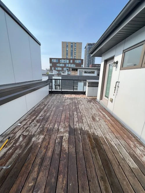 Pressure treated rooftop balcony deck maintenance in Toronto including washing, cleaning, and resealing