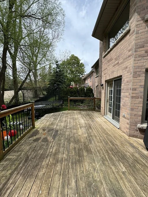 Pressure treated front porch refinishing in the GTA including sanding, sealing, and wood replacement using premium oil stain and sealer