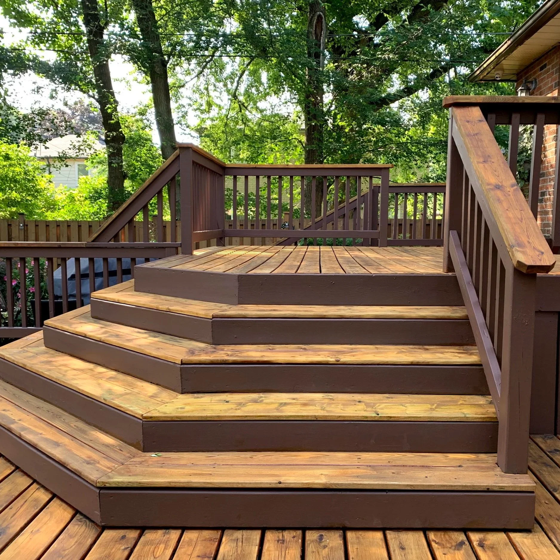 Residential deck refinishing with professional sanding and staining in Toronto