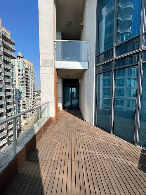 Ipe hardwood deck rooftop maintenance in Toronto using gentle cleaning and UV-protective oil sealing