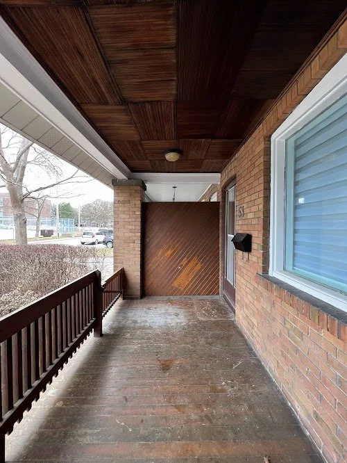 Exterior wood maintenance work extending the life of a residential deck in Toronto