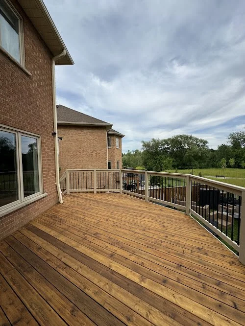 Residential deck staining project improving water resistance and colour depth