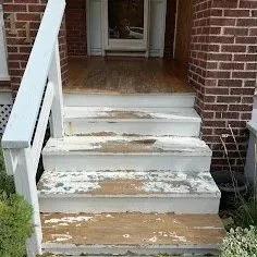 Cedar porch and front steps refinishing in the GTA improving durability with washing, sanding, staining, and sealing with peeling white paint.