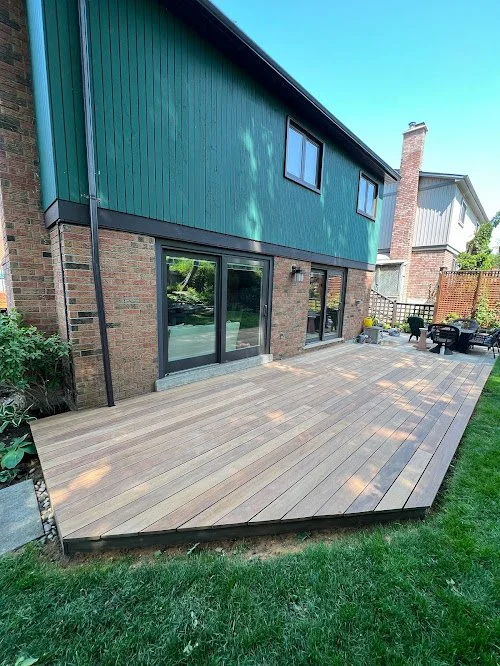 Exterior wood maintenance service protecting deck from moisture and UV exposure