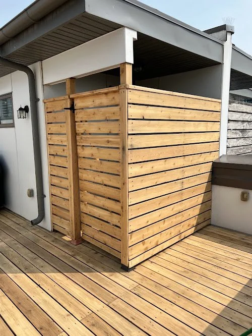 Cedar privacy wall refinishing in the GTA improving durability with washing, sanding, staining, and sealing