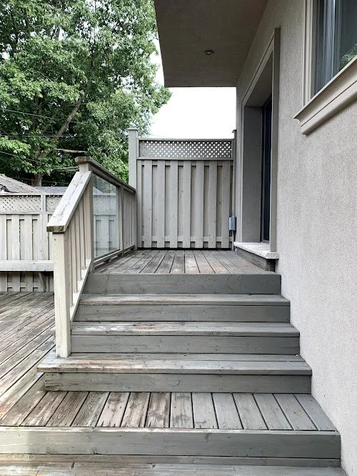 Backyard cedar and pressure treated deck and step refinishing in the GTA including softwashing, cleaning, and resealing using premium oil stain