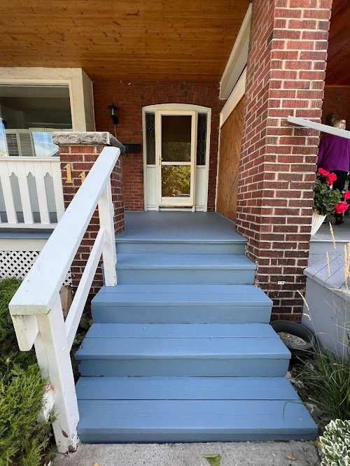 Cedar porch and front steps refinishing in the GTA improving durability with washing, sanding, staining, and sealing with solid water based stain.
