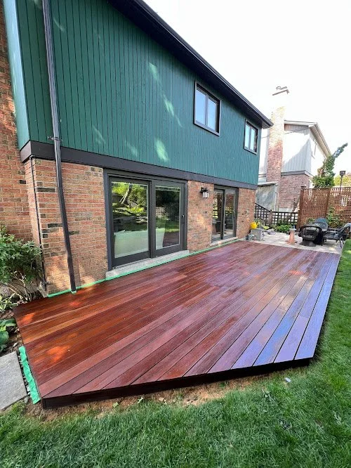 Precision sanding work on residential deck prior to professional staining