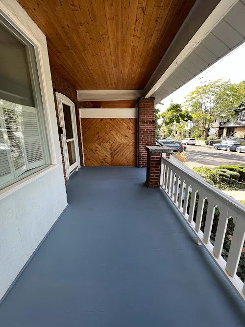 Cedar front porch refinishing in Toronto removing mildew through professional cleaning, sanding and staining using solid water based stain