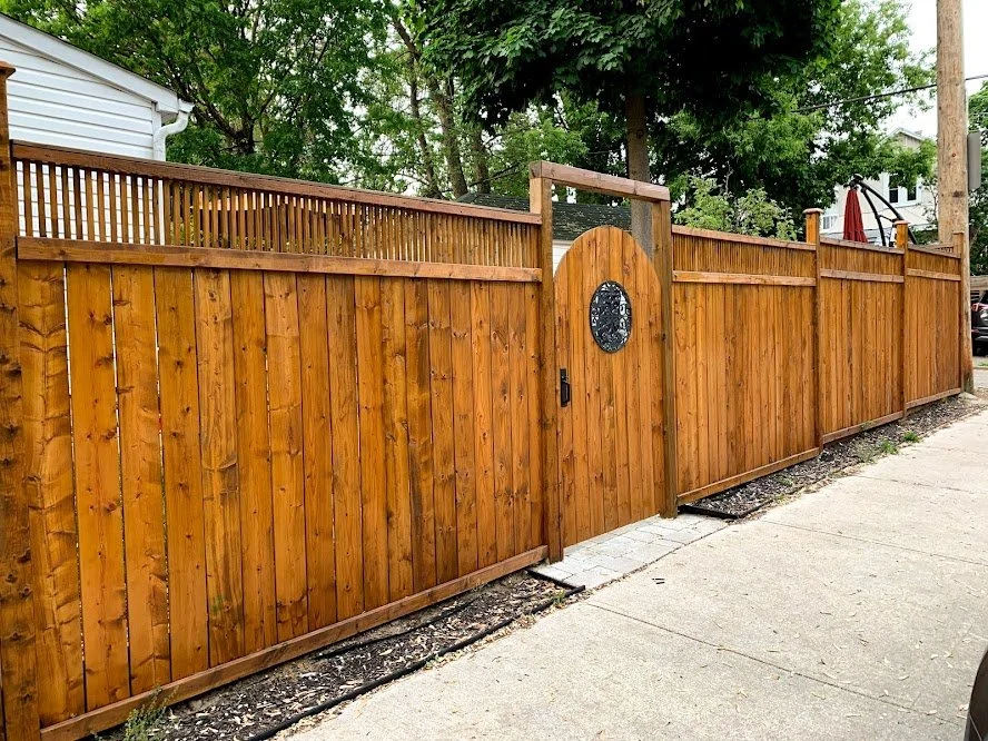 Residential fence sanding and staining for long-term wood protection