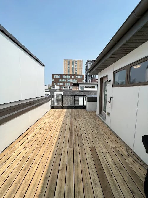 Pressure Treated rooftop balcony deck maintenance in the GTA focused on cleaning, light sanding, and sealing