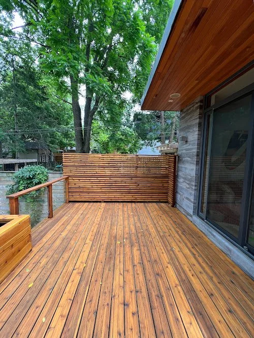 Softwood deck refinishing in Toronto correcting surface damage through sanding and staining