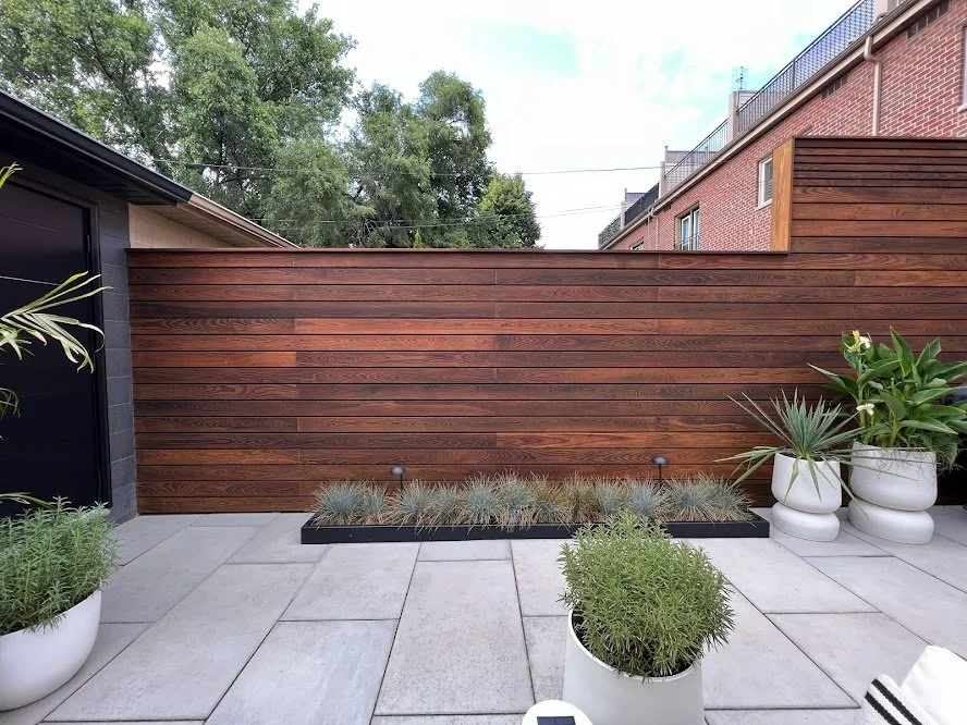 Backyard deck refinishing project using weather-resistant stain for long-term protection