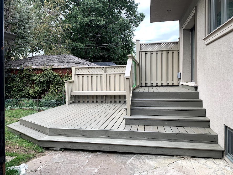 Pressure treated backyard deck refinishing in downtown toronto including softwashing, cleaning, and resealing using premium oil stain