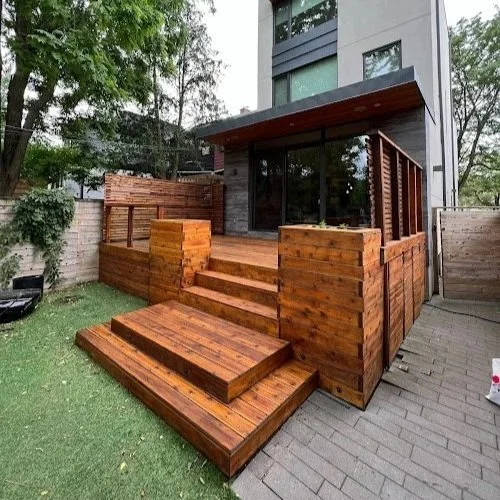 Residential softwood deck refinishing in Toronto with full sanding and stain application