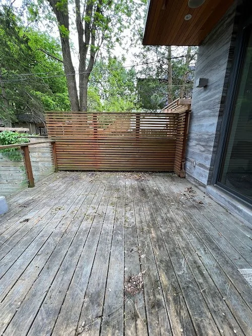 Residential cedar deck refinishing in Toronto improving curb appeal with professional staining