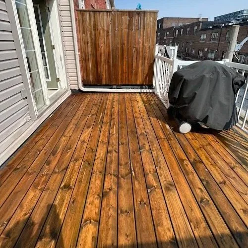Proper Finish residential deck refinishing project with uniform stain coverage