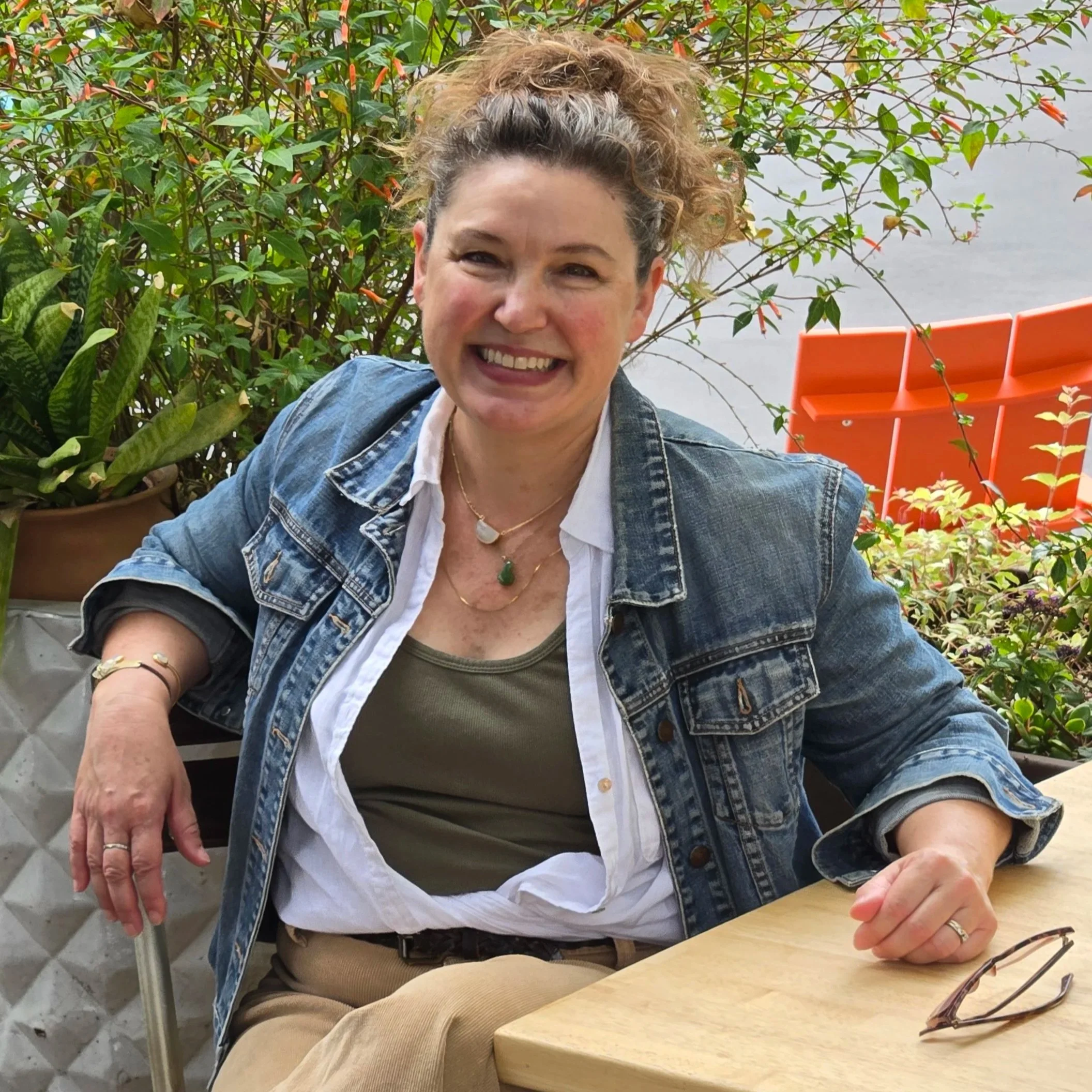 This is Megan Sachs at a meeting with a new client to learn about the spaces and needs she can help them with.