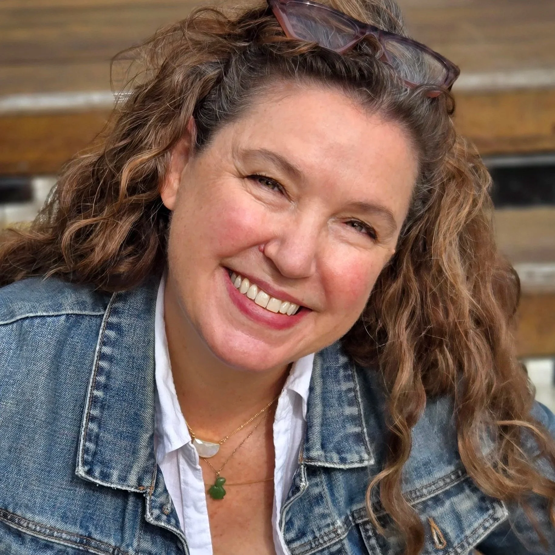 This is a portrait of Megan Sachs.  She creates spaces that inspire joy, with custom plans, strategies and systems tailored to your needs.