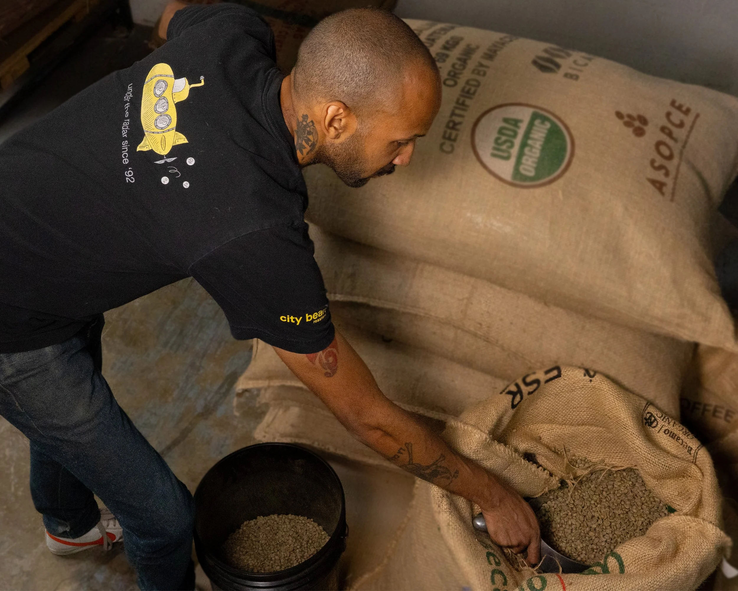 City Bean Roasters Scooping Beans 1.jpg