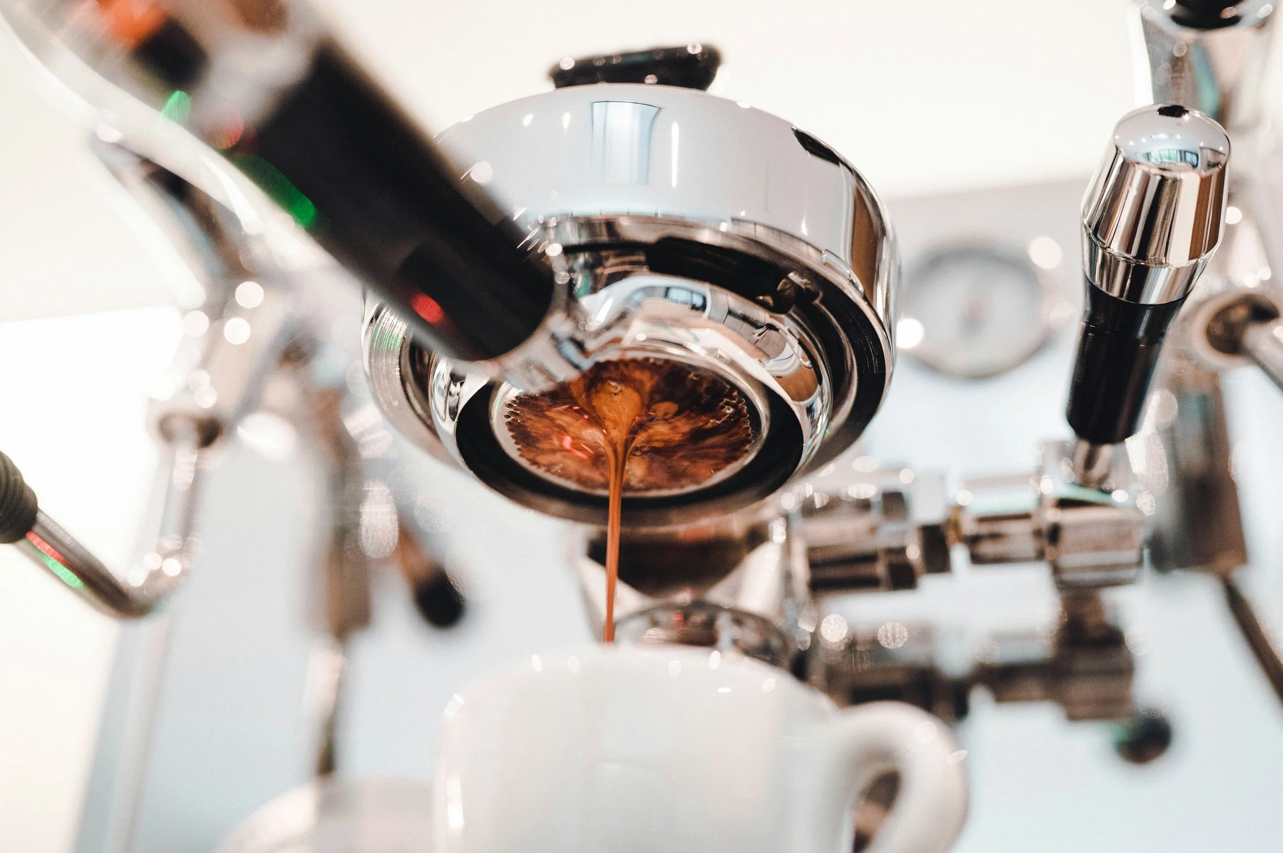 Espresso machine making coffee.