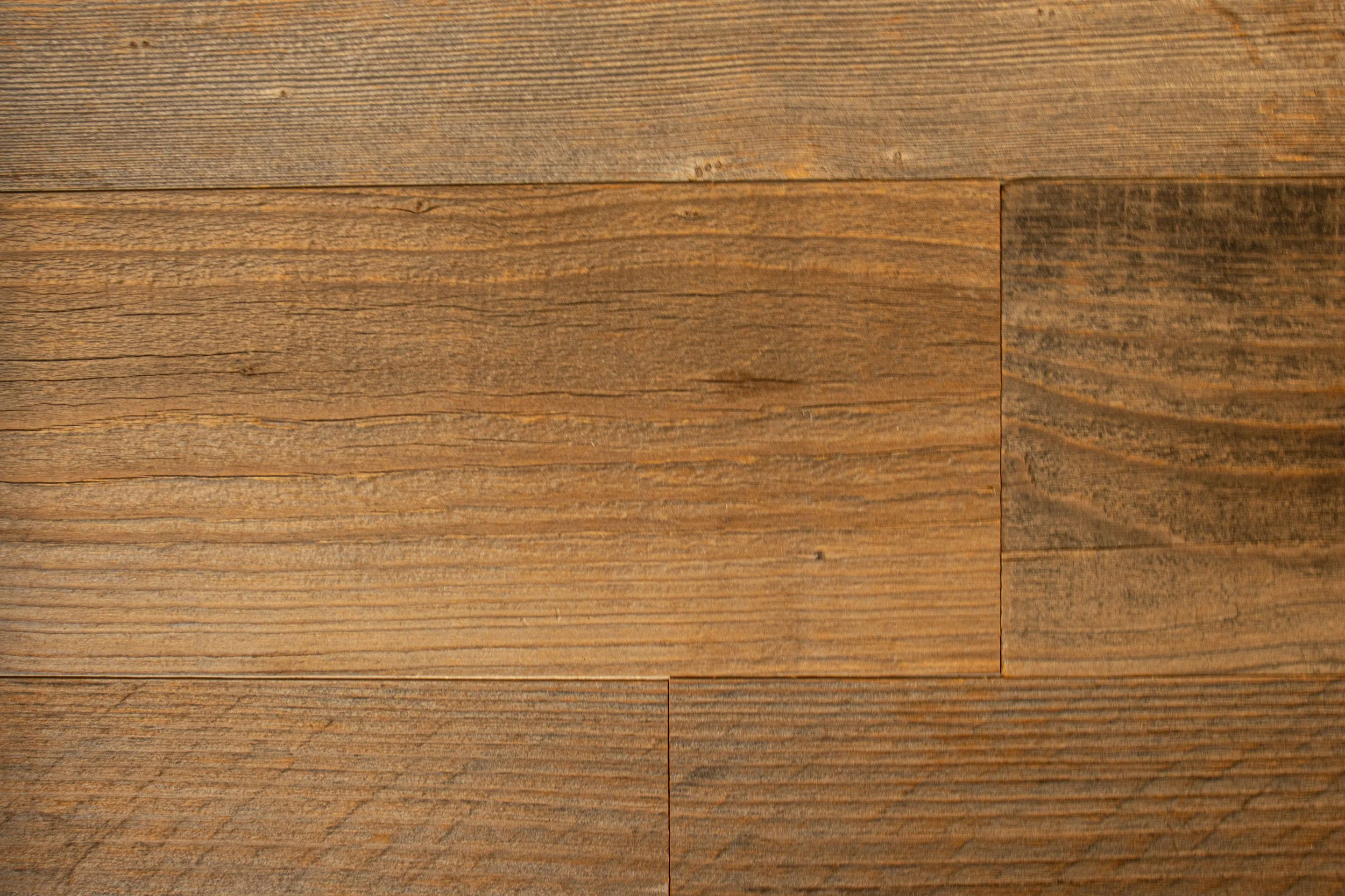 Close-up of a wooden surface with visible grain and textures.