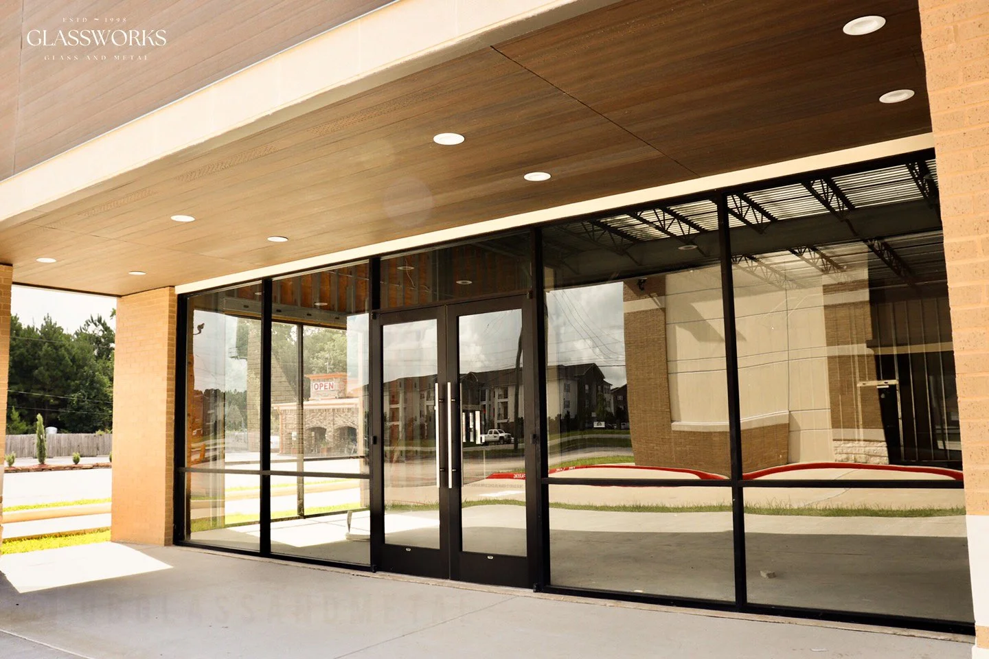 New commercial storefront glass doors and windows installed by Glassworks for retail property