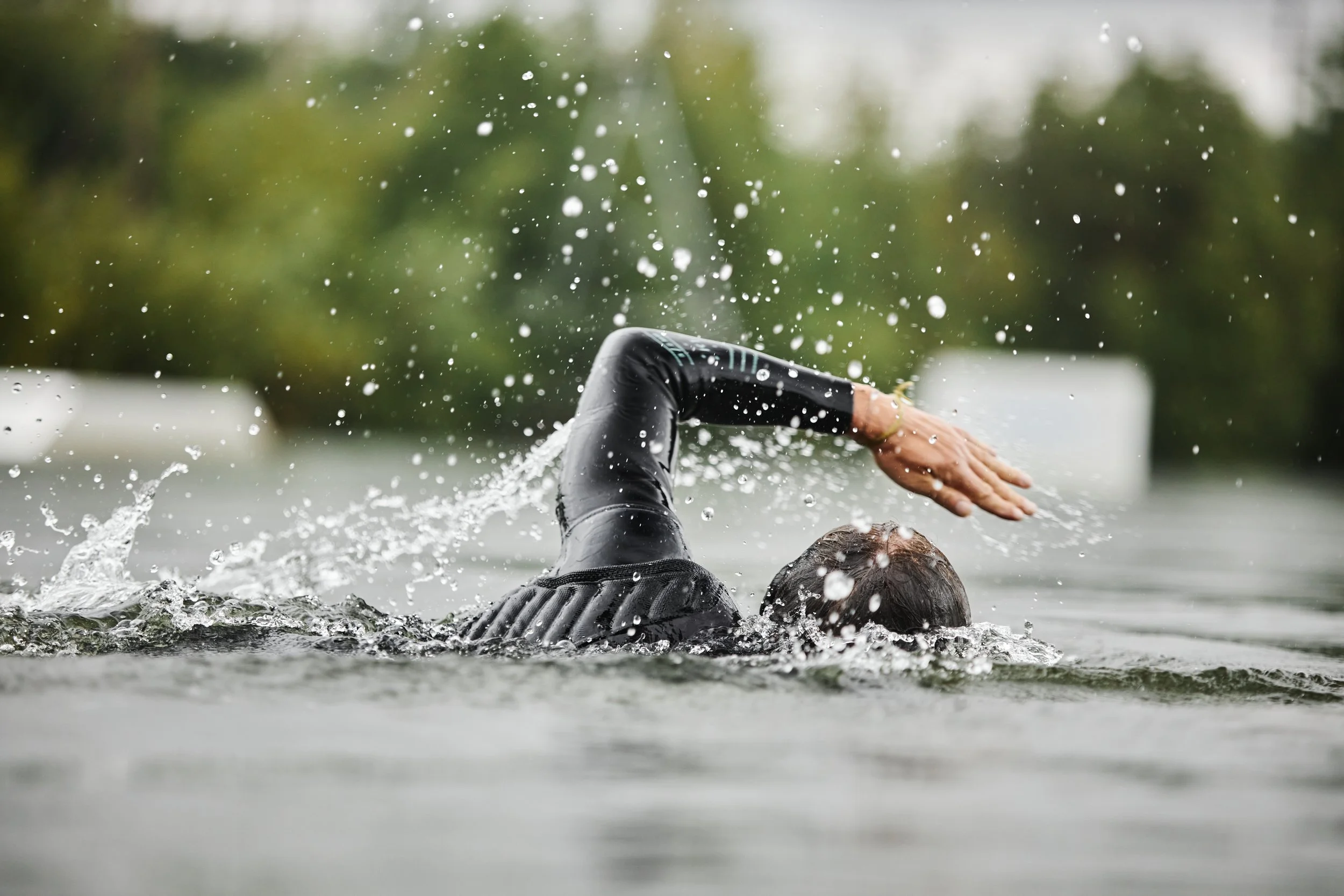 man-swimming-in-lake-with-water-splashes-2026-01-08-06-41-54-utc.jpg