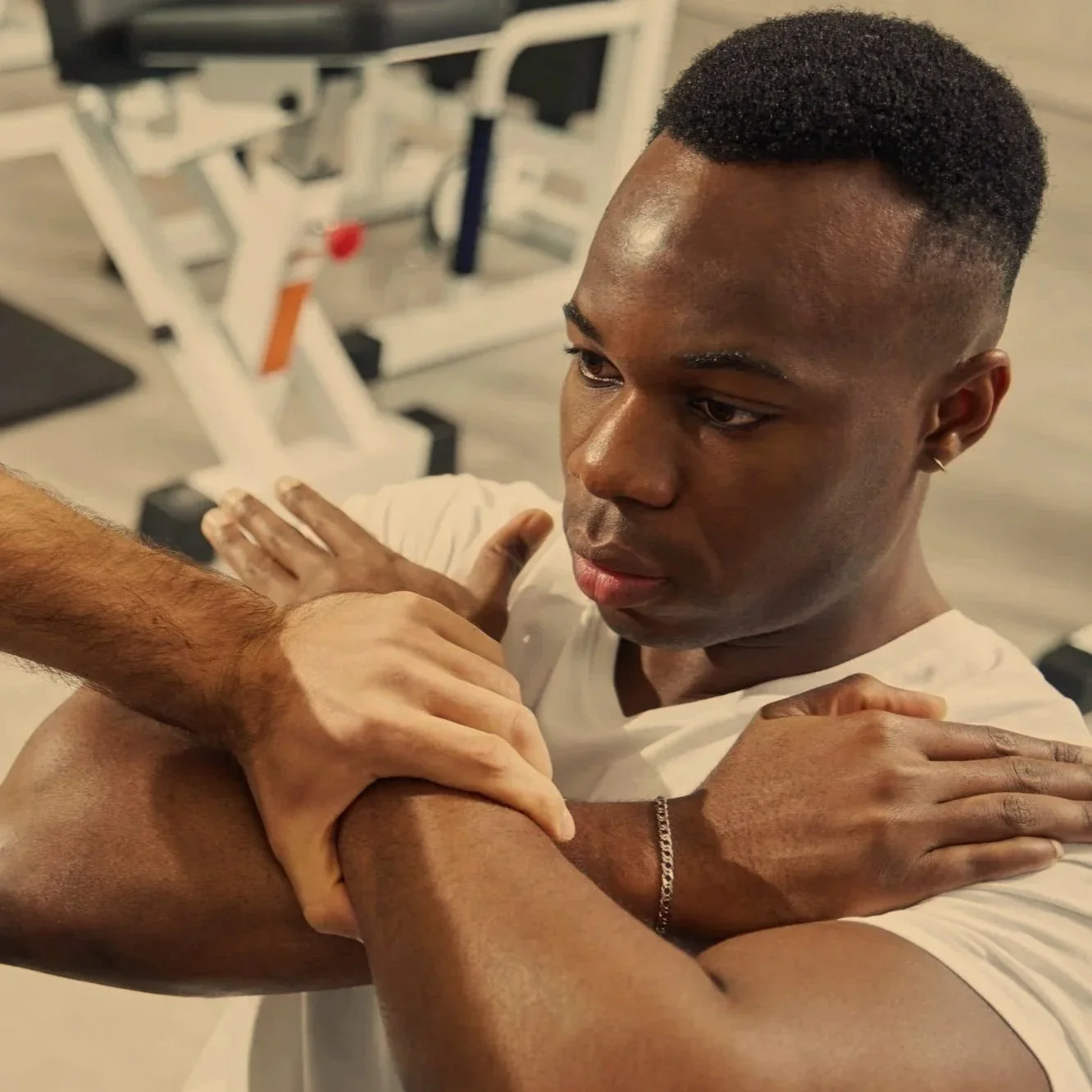 young-male-patient-undergoing-muscle-strength-asse-2026-03-20-00-16-57-utc.jpg