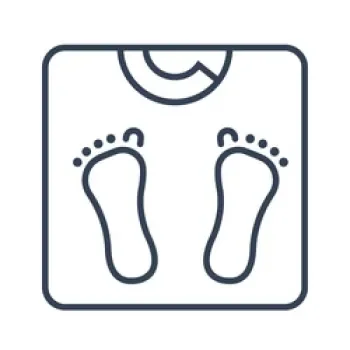 Line drawing of a person’s feet on a scale.
