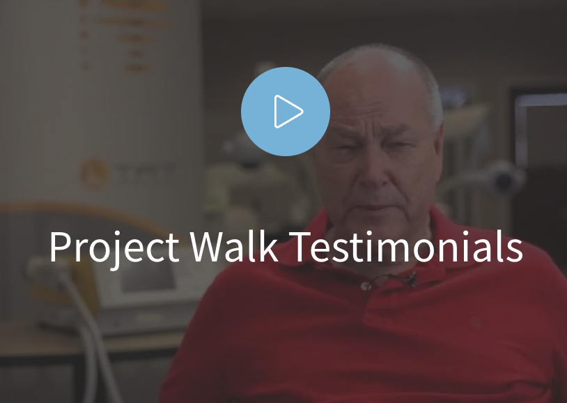 Thumbnail of a testimonial video featuring an elderly man in a red shirt with a serious expression, labeled 'Project Walk Testimonials'.