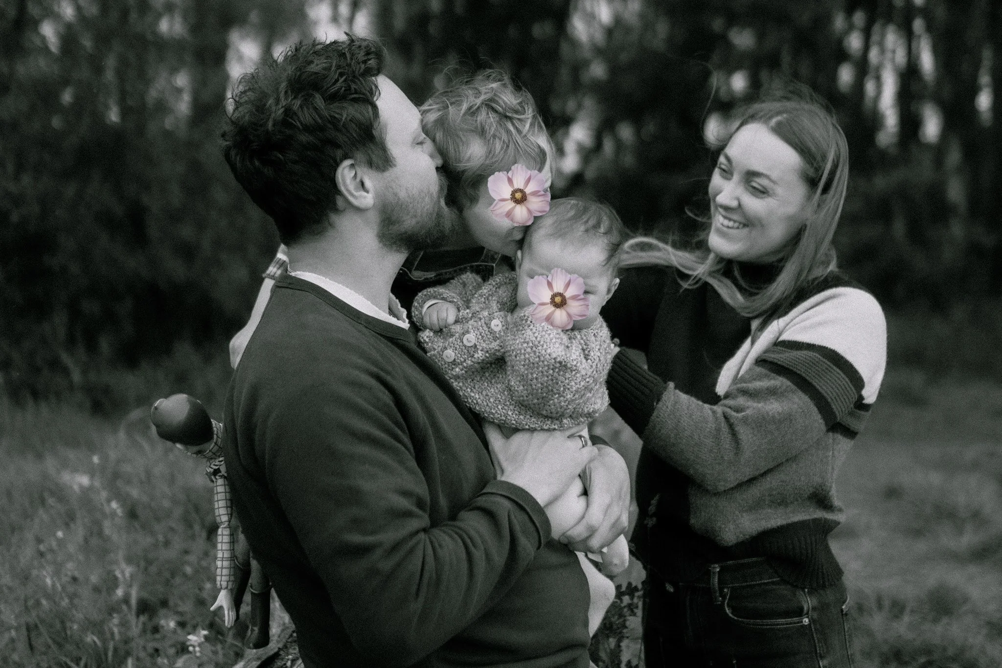 natural candid family photography of happy family with mum, dad, toddler, newborn outdoors by a loch in Scotland. Unposed family photography near Kinross, Perthshire