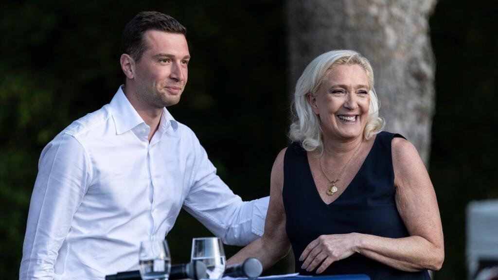 Joint Photo of Marie Le Pen and Jordan Bardella.