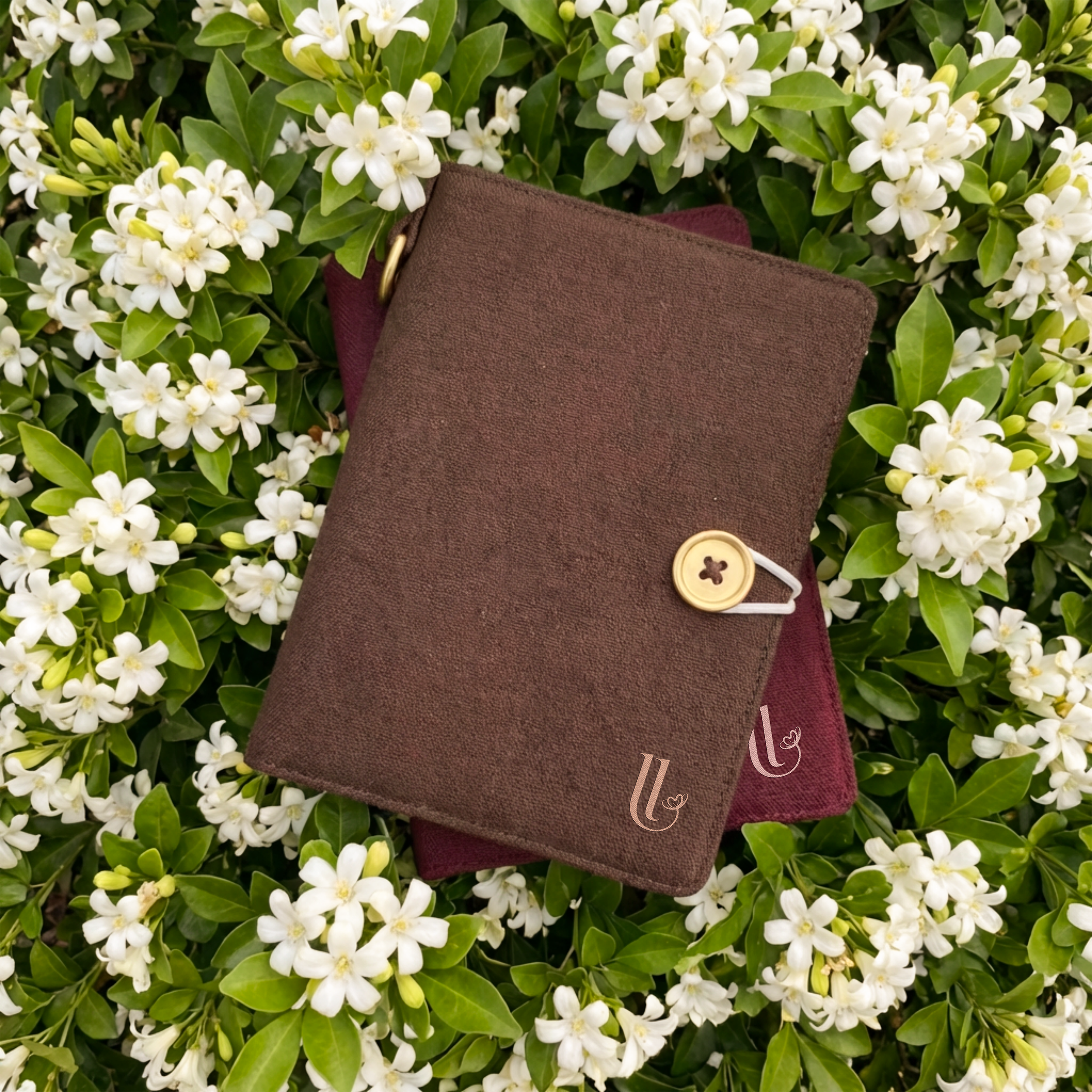 brown and maroon covers and sampaguita.png