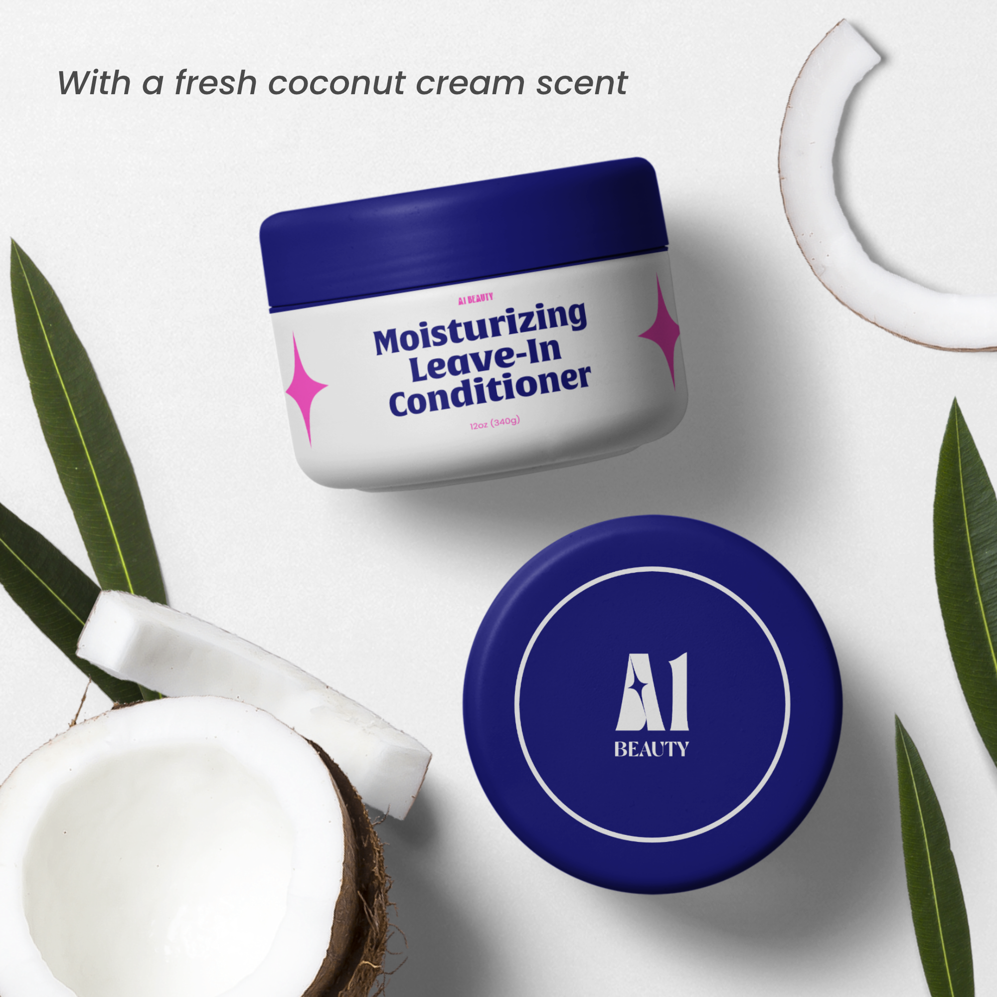 A flat lay of a coconut half, a jar of moisturizing leave-in conditioner, green leaves, and a blue container on a white surface.