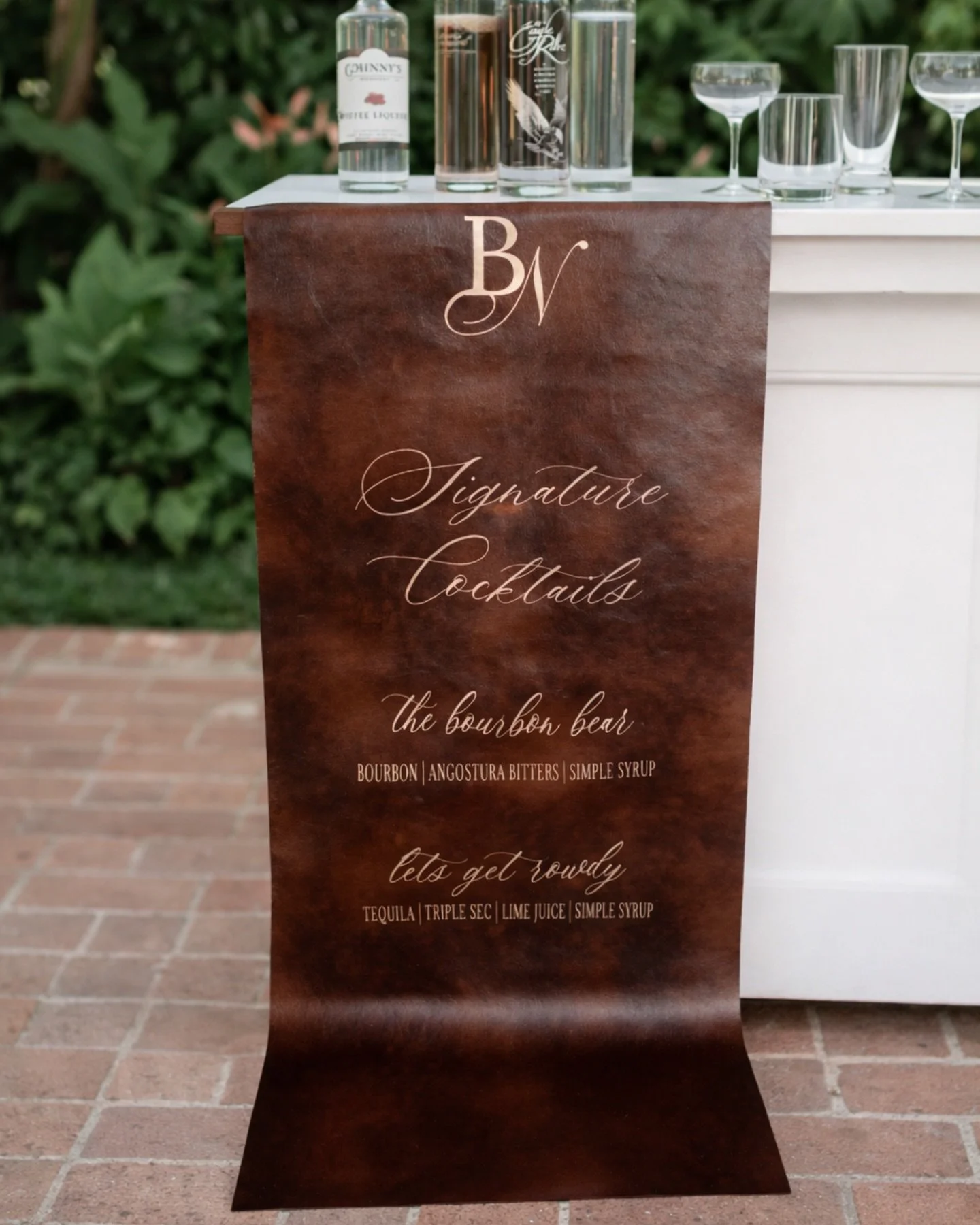 Leather accents are showing up more and more in wedding and event details and we&rsquo;re loving the texture it brings! 

We recently made this leather bar sign for a couple and really enjoyed the process of keeping it simple and bold! It adds just t