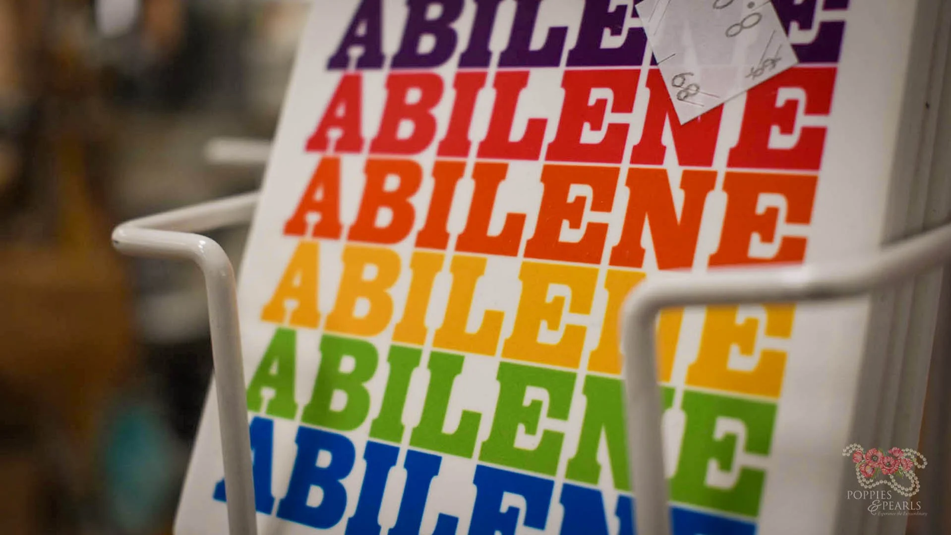 Colorful stickers with the word 'ABLE' in rainbow colors, arranged in vertical columns.