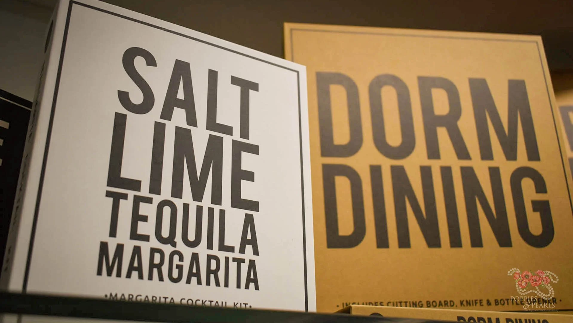 Boxes with words 'Salt Lime Tequila Margarita' and 'DORM DING' printed on them.