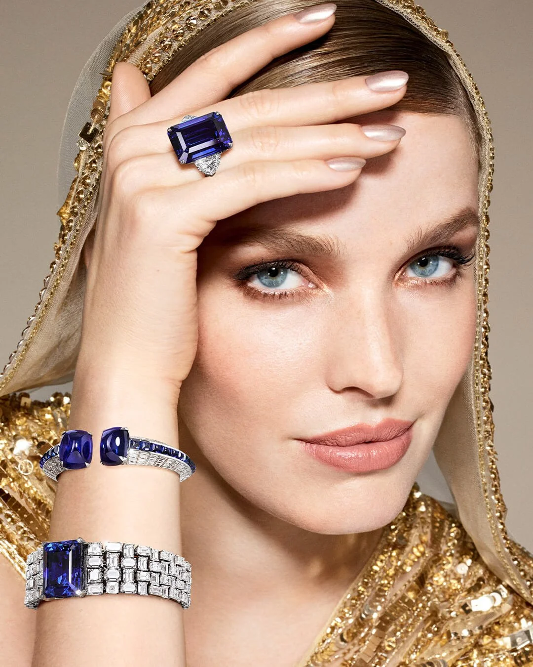 Close-up-of-a-woman-wearing-Graff-sapphire-and-white-diamond-high-jewellery.jpg