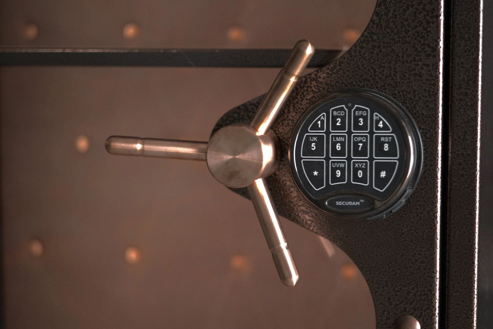 Close-up of a digital safe lock with a metallic handle and a keypad.