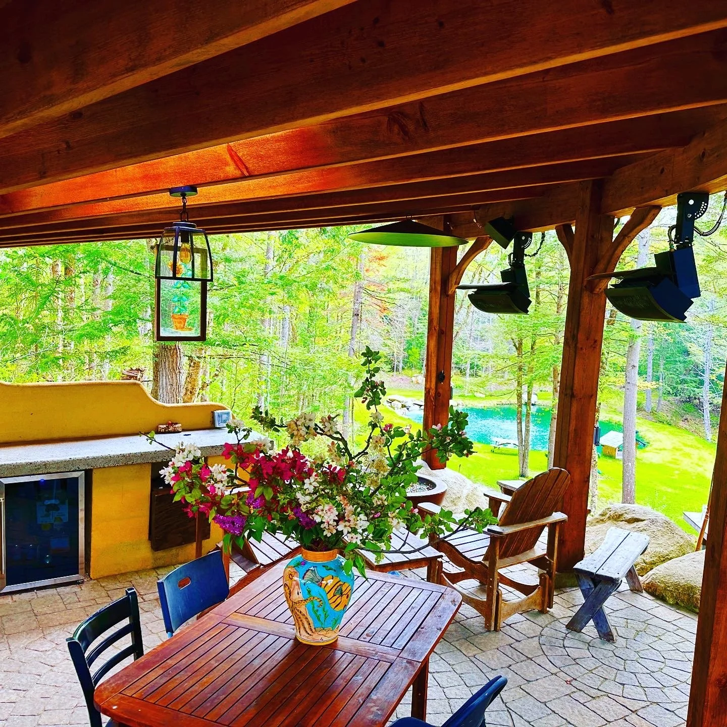 Outdoor kitchen with flowers n emerald green.JPG