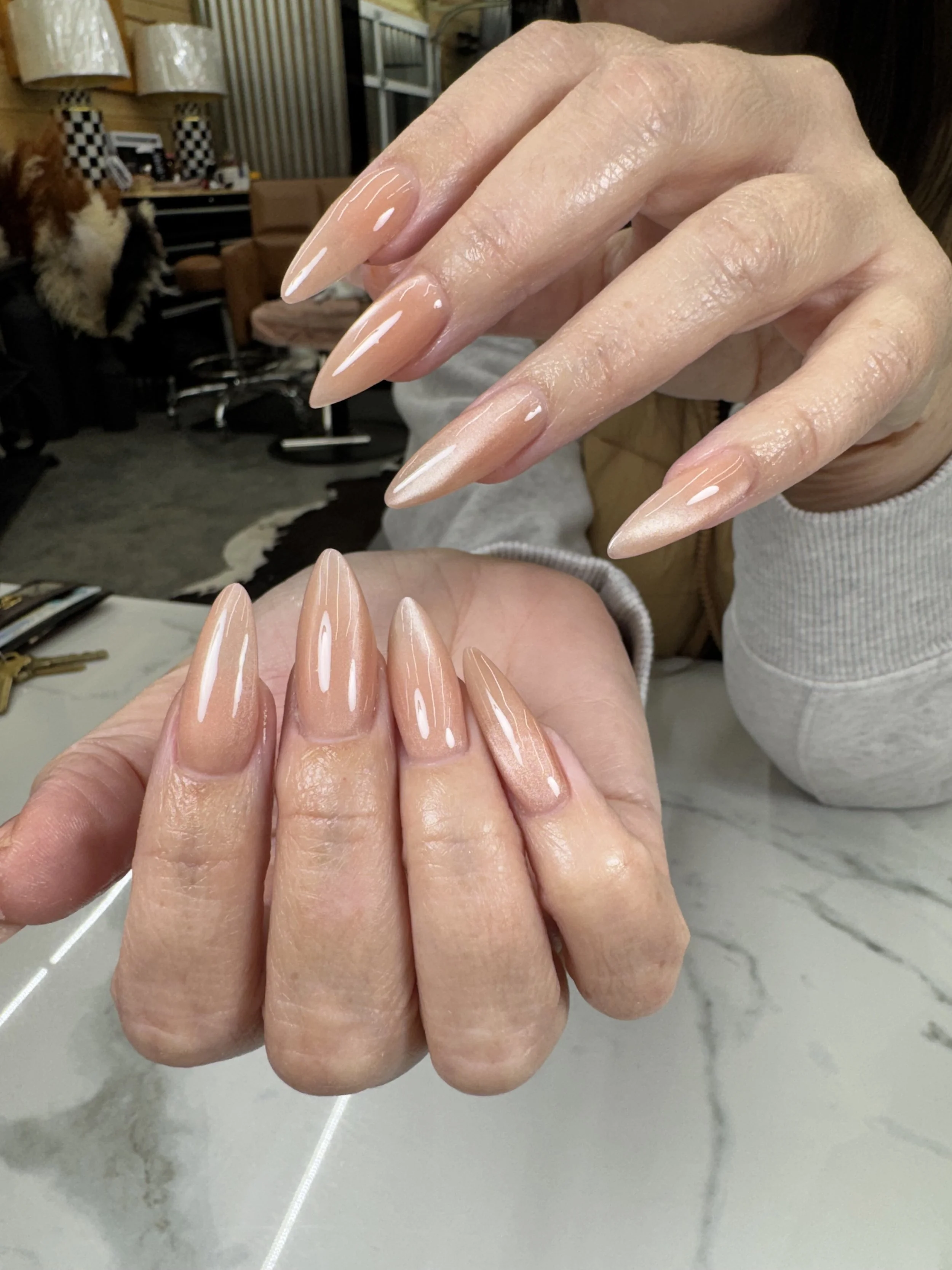 nude cat eye nails on acrylic nails